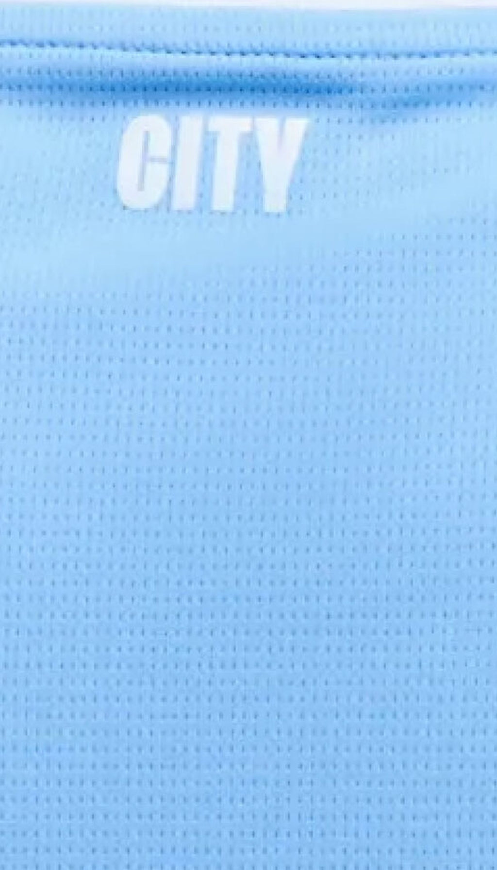 Manchester City local 2026/27 versión jugador — detalle CITY y tejido técnico