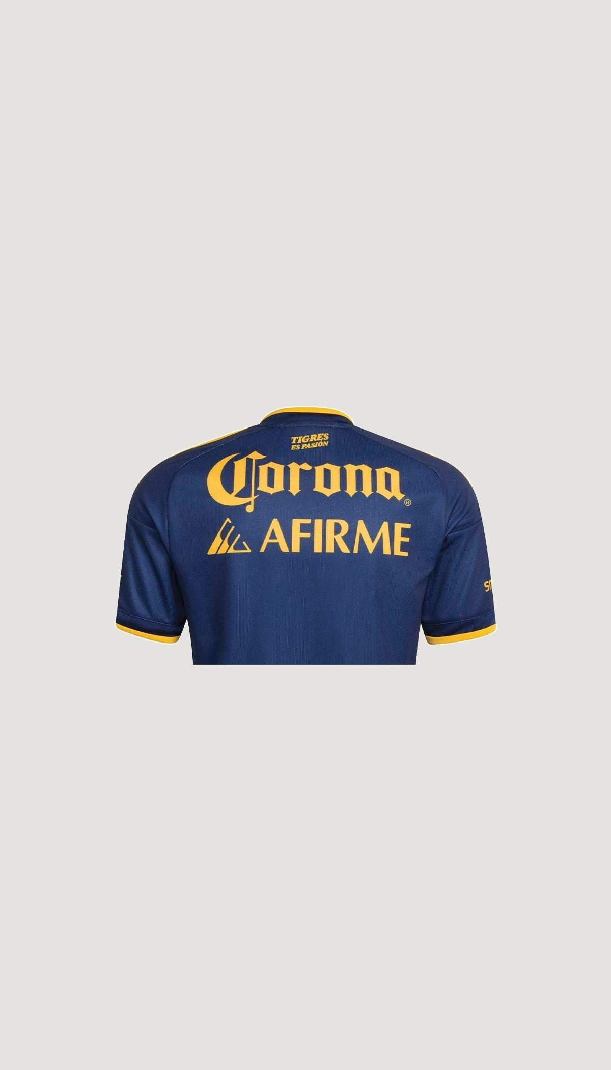 Tigres UANL visitante 2025/26 versión jugador — detalle de patrocinadores posteriores